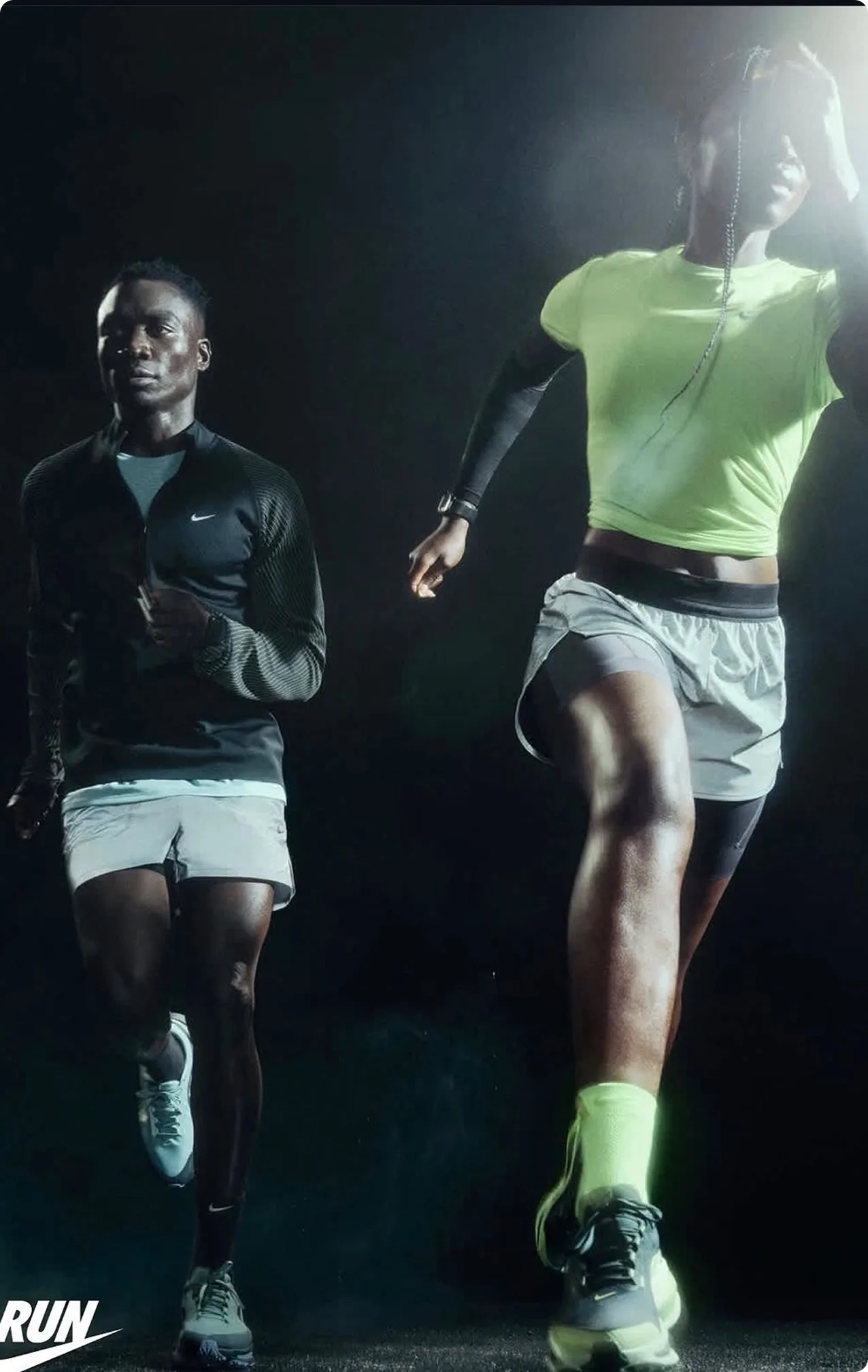 Nike Vomero — two runners mid-stride in low-light