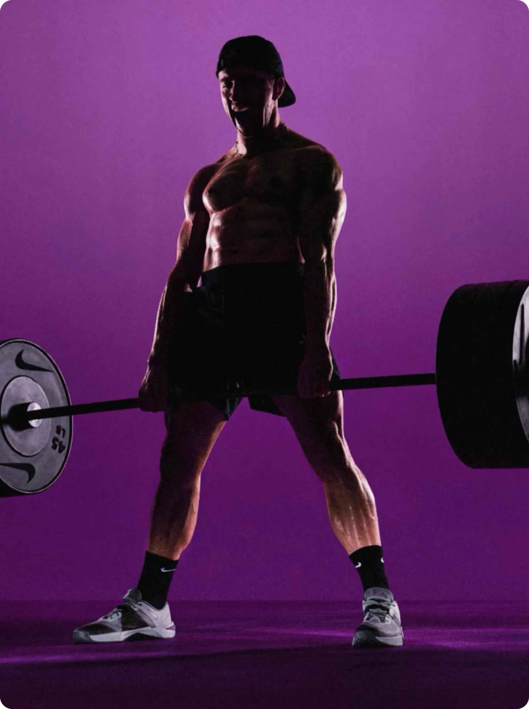 Stability — athlete with barbell, purple lighting