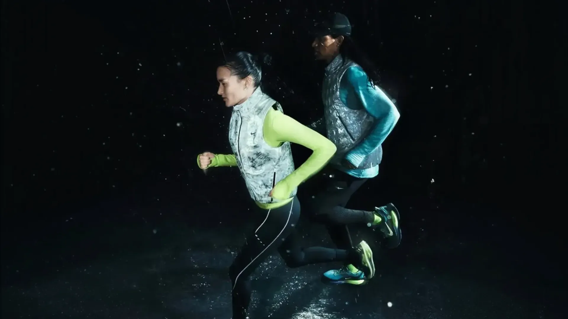 Nike Vomero 18 GORE-TEX — two runners in rain and low-light conditions