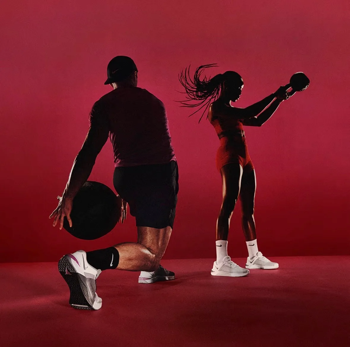 Nike Metcon 10 — athletes training with medicine ball, red background